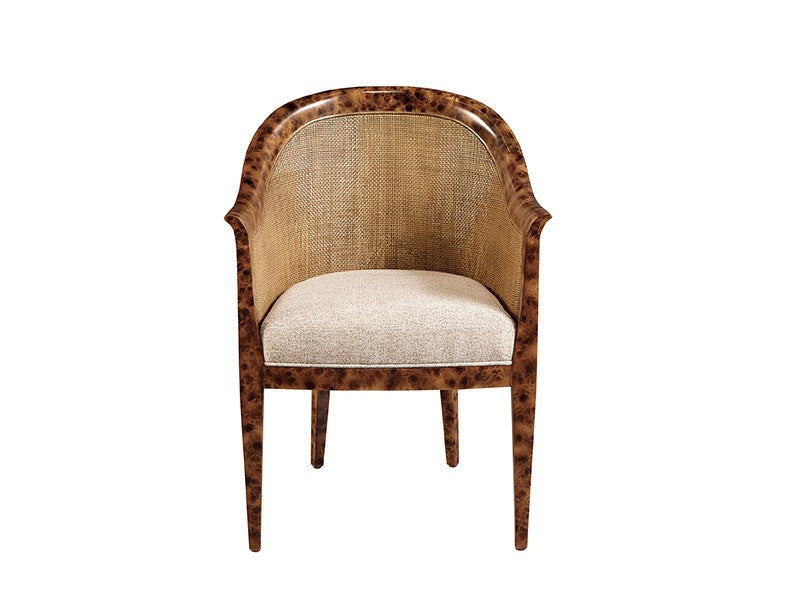 Chair with tortoiseshell frame and beige cushion on a white background