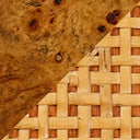 Close-up of a woven pattern on a wooden surface